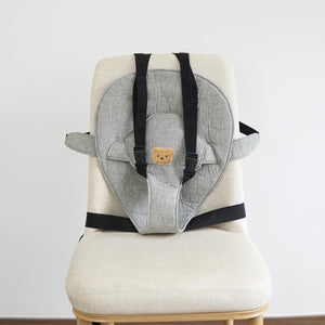 Bevestigingsriem voor baby eetstoelkussen